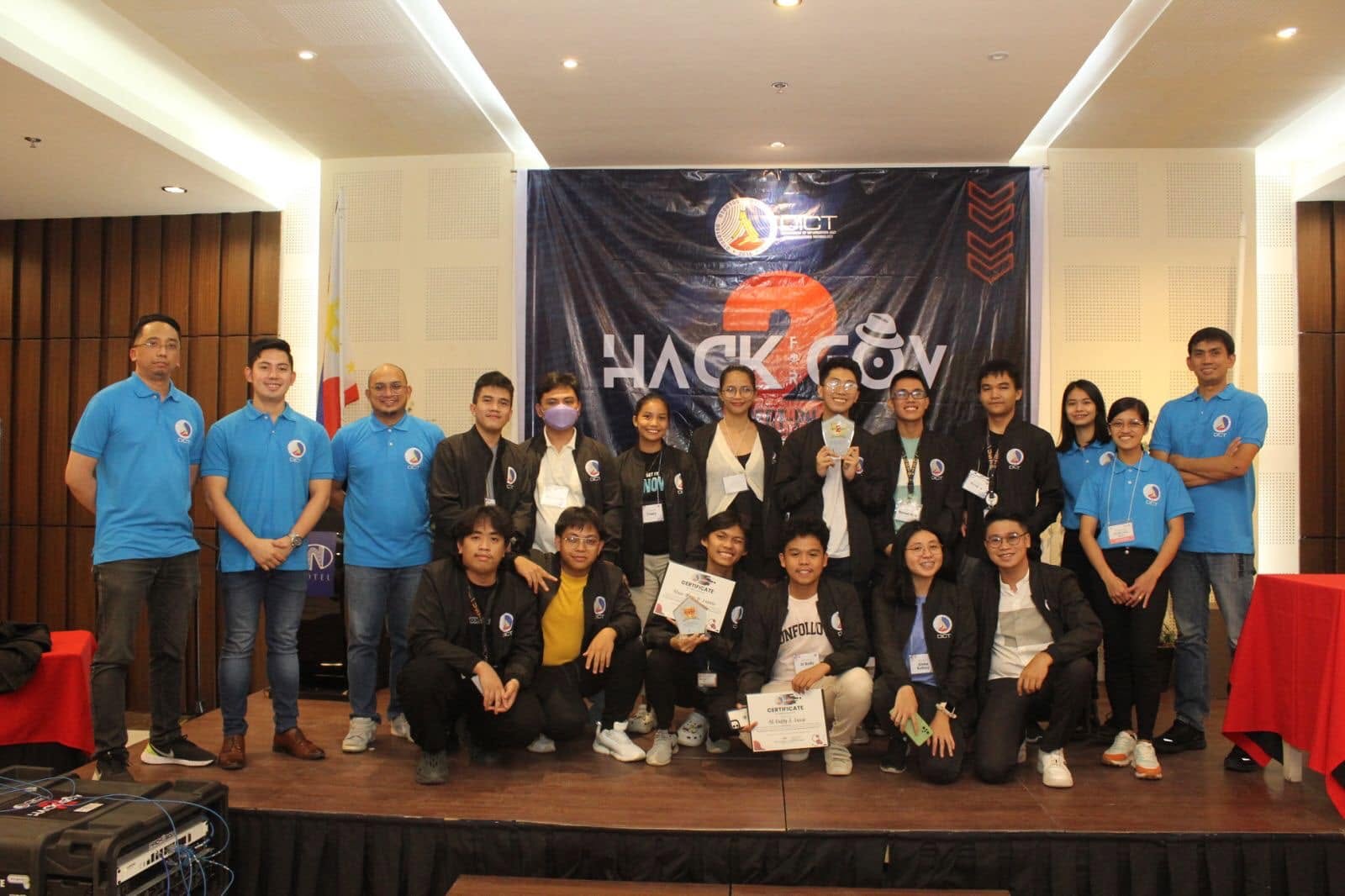 Hack4Gov 2 Region 10 competitors and organizers on stage